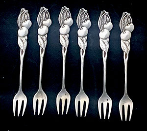 Tiffany set of six sterling cherry forks